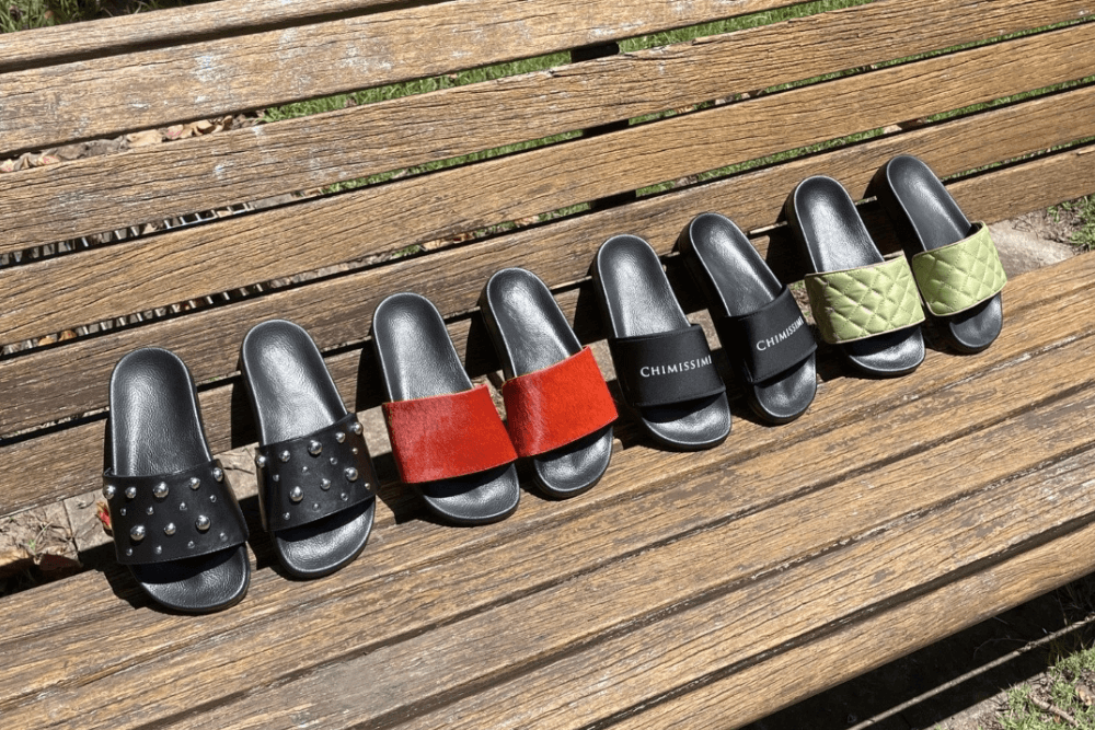  Chimissimi slides with different uppers on a wooden bench