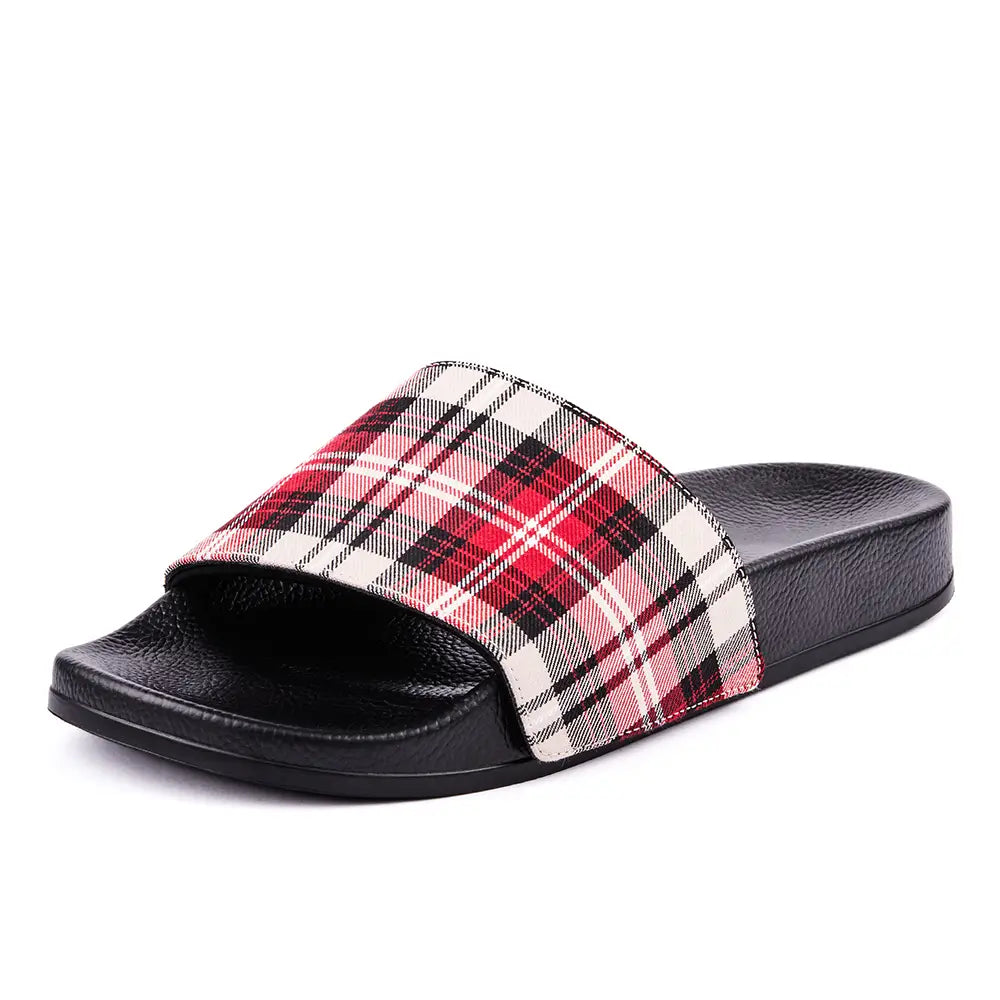 Australian designer black slides with upper in chequered patterned canvas in red, ivory, white, brown and black.