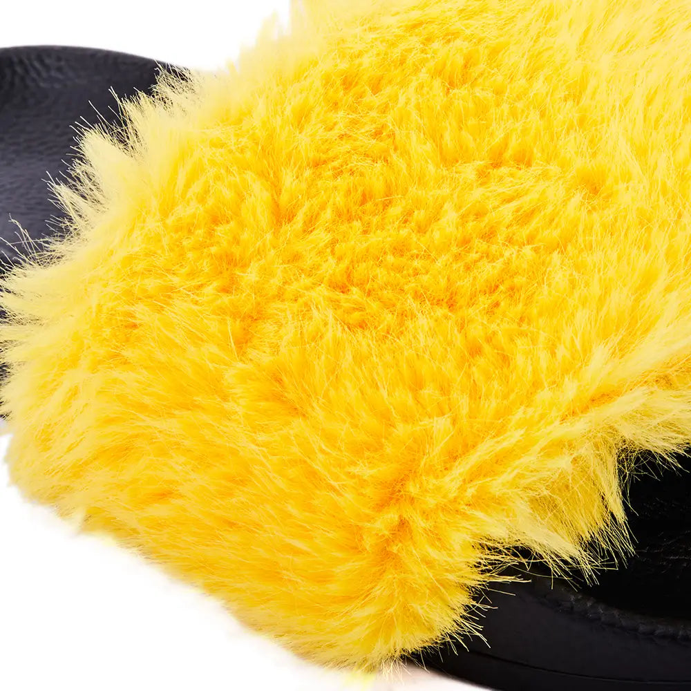 Black slides with fluffy yellow fur upper.