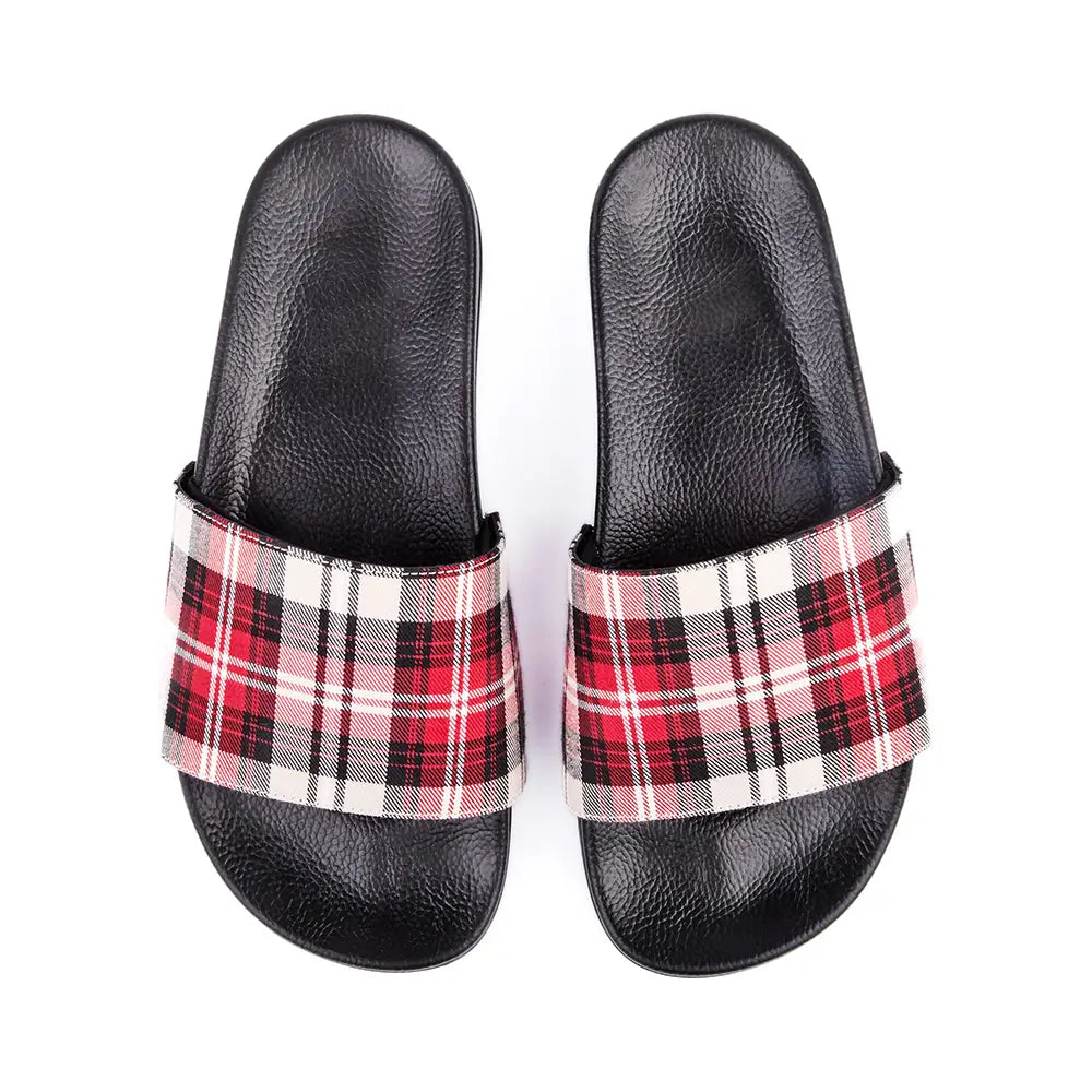 Australian designer black slides with upper in chequered patterned canvas in red, ivory, white, brown and black.