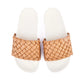 White slides with braided faux leather upper in camel colour.