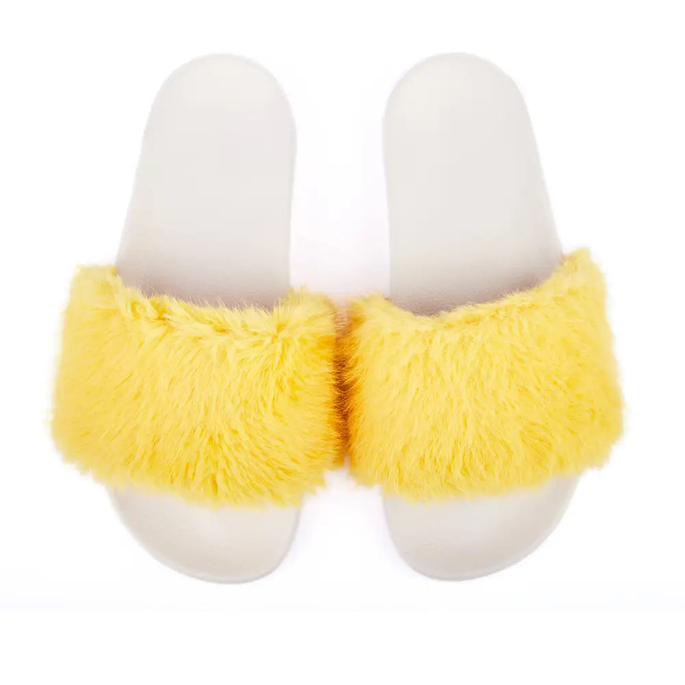 White slides with fluffy yellow fur upper.